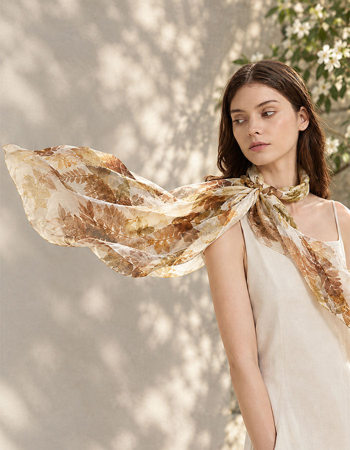 Botanical eco print scarf with warm natural leaf impressions by Sylra Studio
